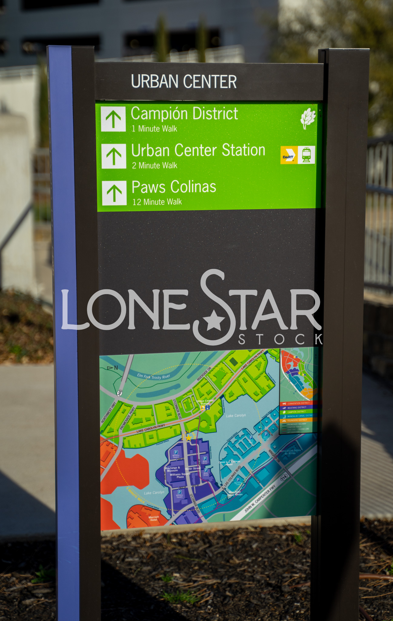 Preview of Urban Center Map and Directory Sign with Arrows Pointing Forward to Campion District, Urban Center Station, and Paw Colinas